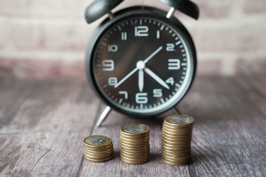Coins and a clock representing ACA open enrollment 2027 deadlines running November 1 to January 15