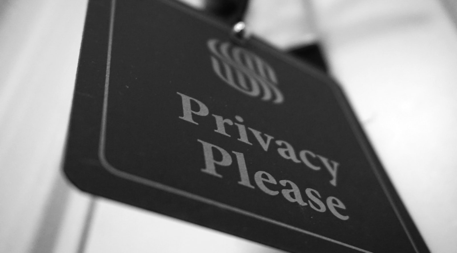 Black and white privacy please sign, representing the personal data protection covered by the best identity theft protection services in 2026