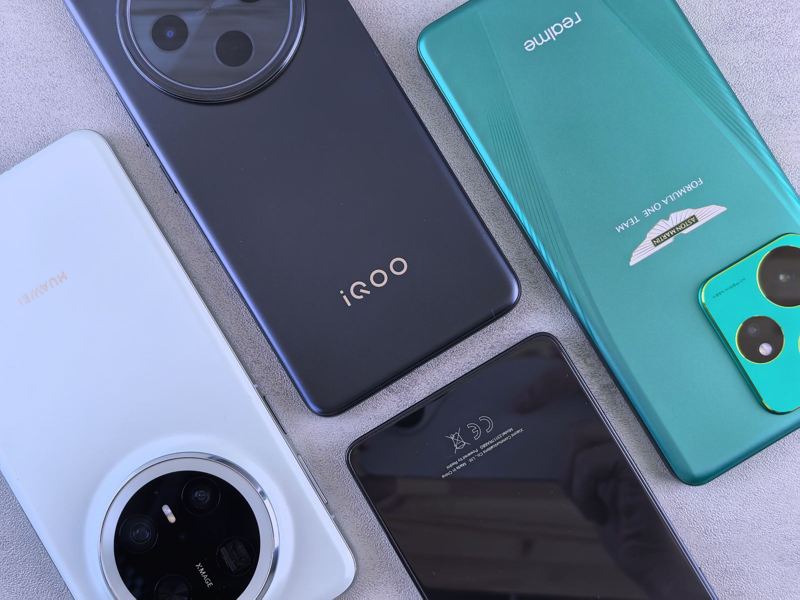 Best smartphones 2026 flat lay showing top flagship and budget phone models