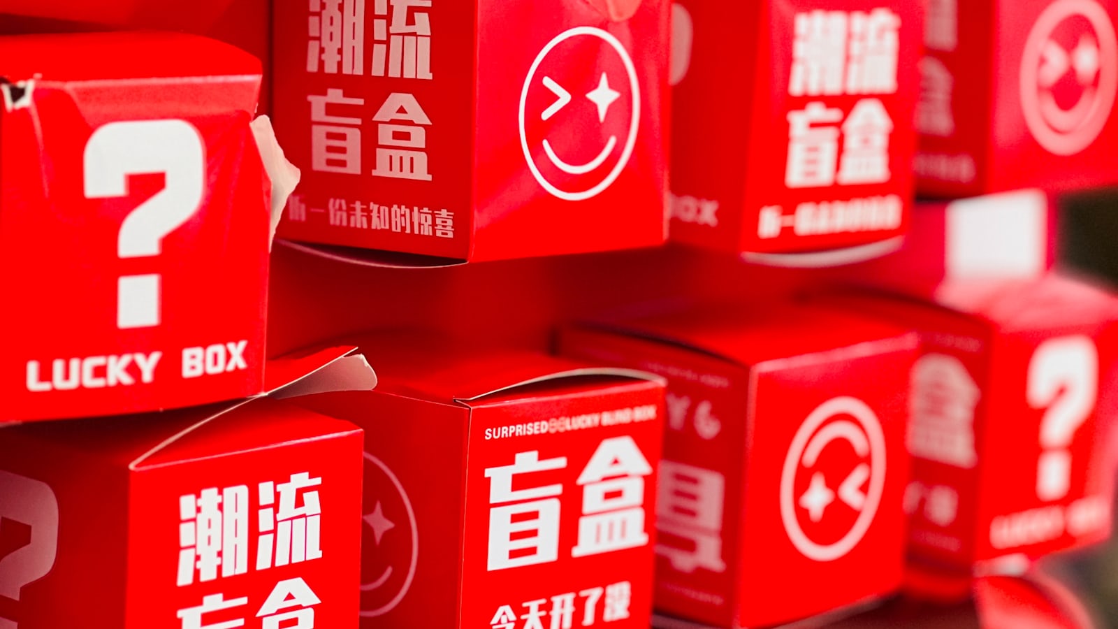 Red mystery boxes with question marks representing BGMI Classic Crates and the luck-based system for getting the M416 Glacier