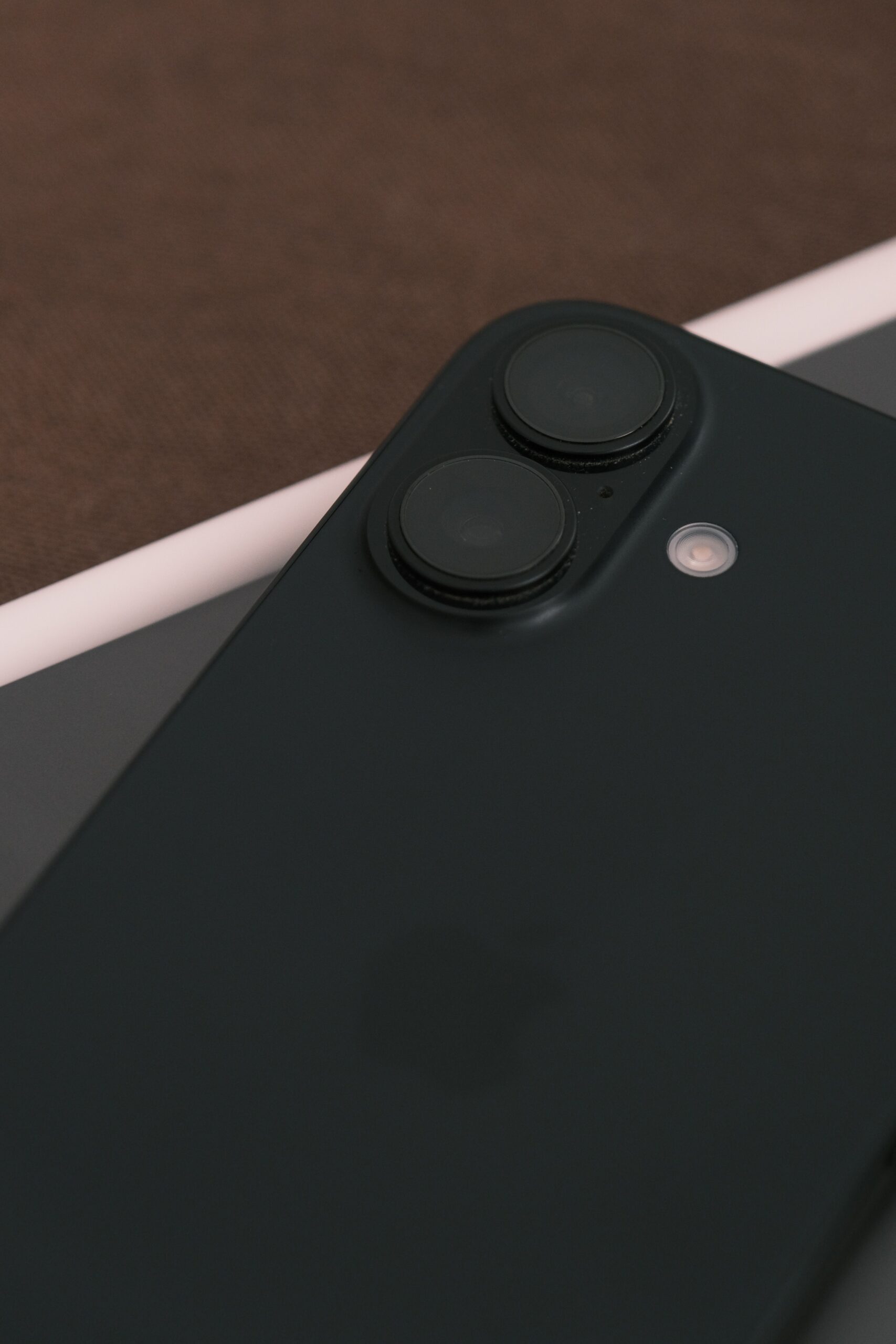 Close-up of a dual-lens smartphone camera module, representing the Google Pixel 11 Pro Fold triple rear camera system