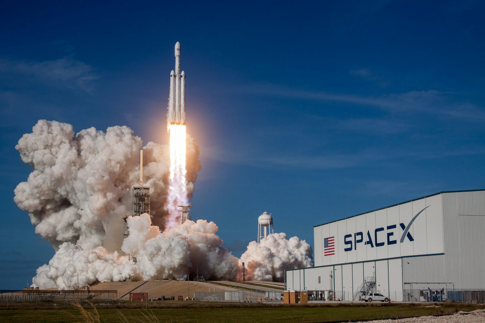 SpaceX rocket launching, illustrating SpaceX's $60 billion Cursor acquisition of the AI coding startup