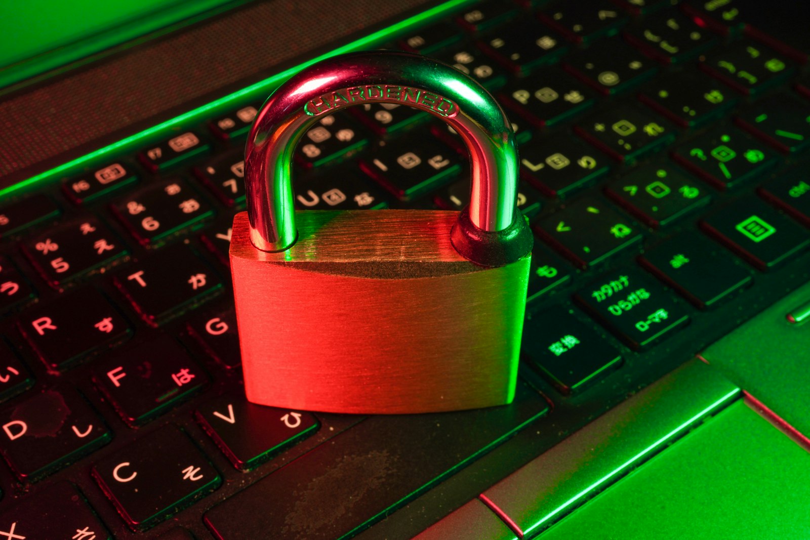 Red padlock resting on a black computer keyboard, representing the ransomware attack that exposed ATF investigation files in the 2026 Qilin data breach
