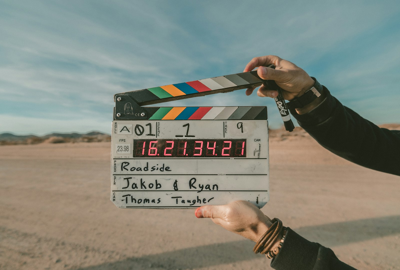 Film clapperboard on set, symbolizing AI-generated video production tools like Sora, Veo, and Runway in the best AI video generator 2026 comparison