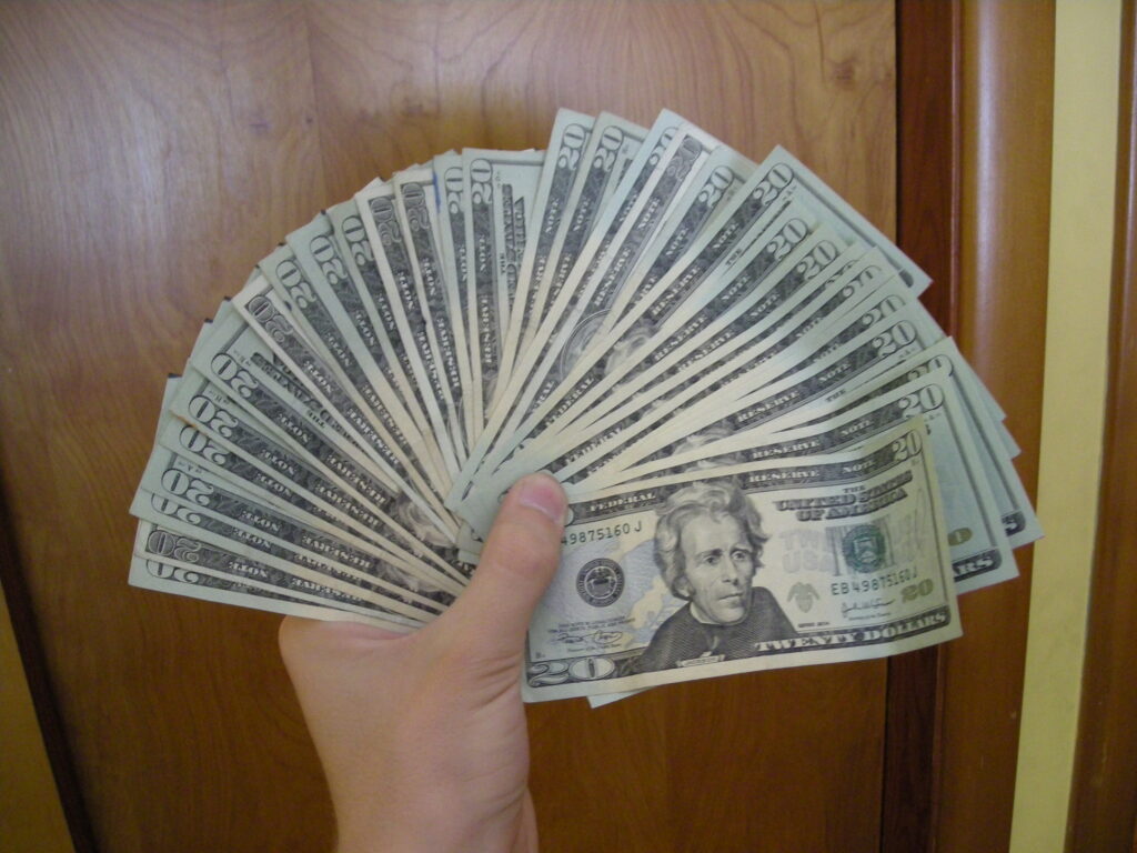 US dollar bills representing consumer prices tracked by the August 2026 CPI inflation report