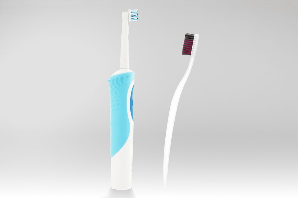 Electric toothbrush representing the new category of AI-powered oral care devices like the Dyson CameraJet