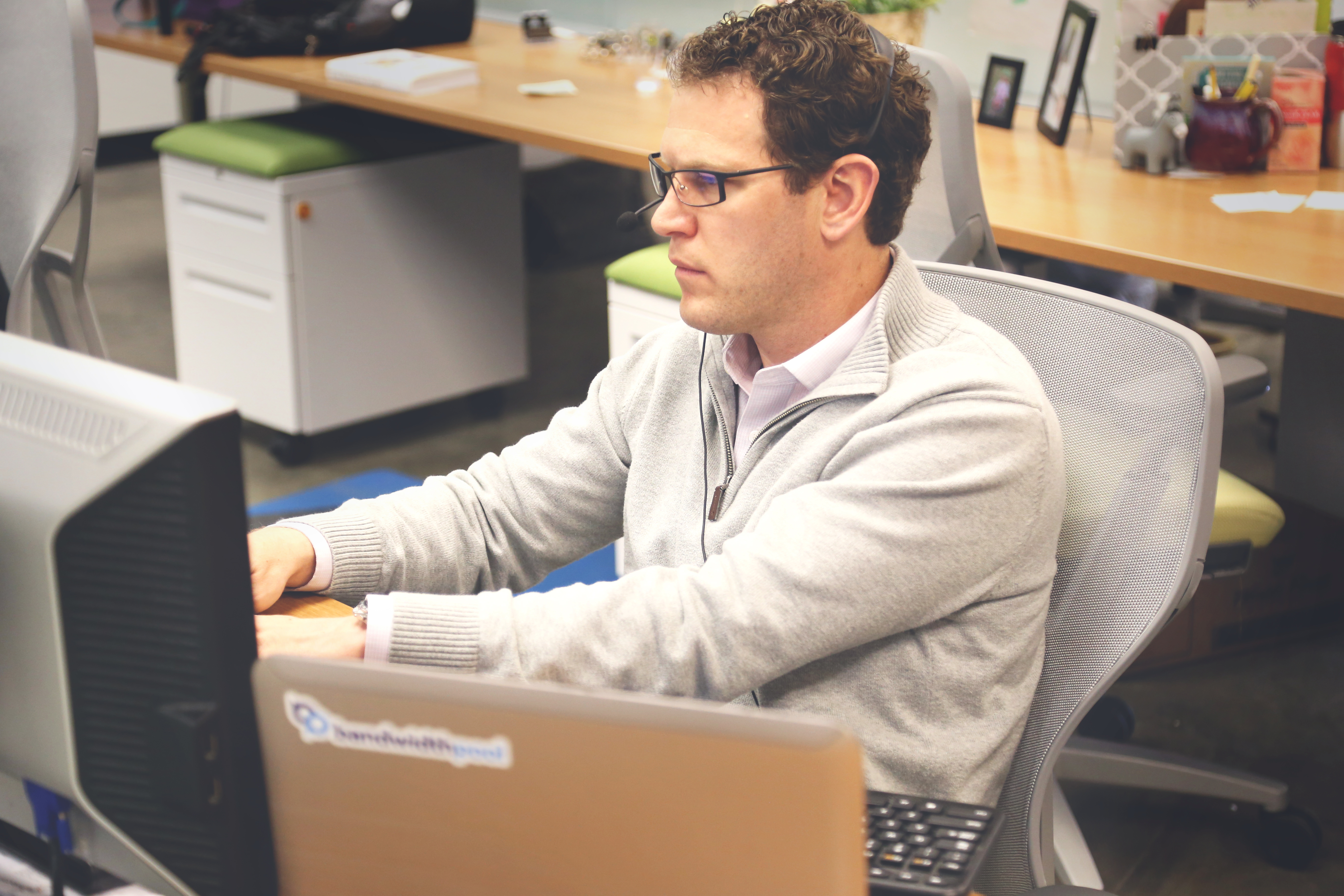 Coworking desk setup used for tracking project management productivity tasks