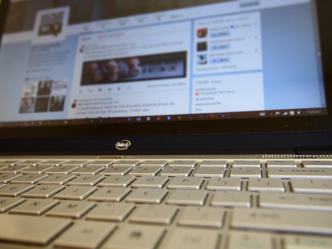 Laptop showing social media apps, representing social media marketing productivity tools